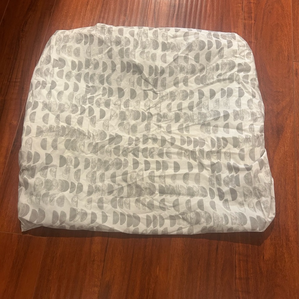 Pottery Barn Kids x West Elm crib sheet in half moon pattern